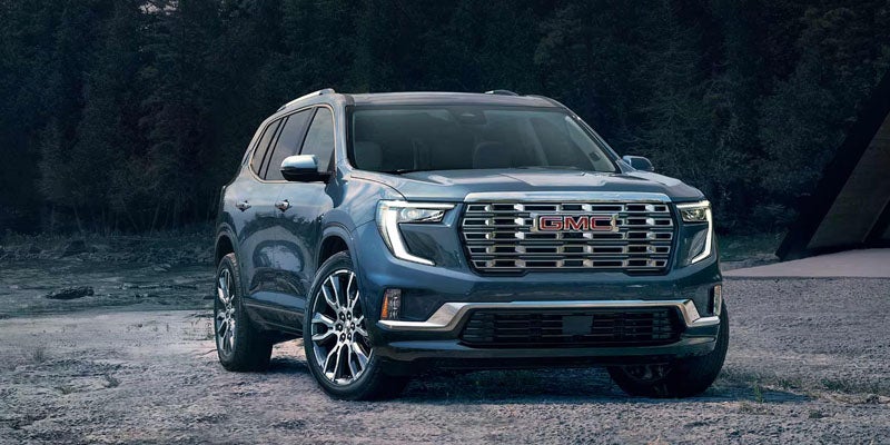 GMC Acadia showcasing bold grille and advanced safety